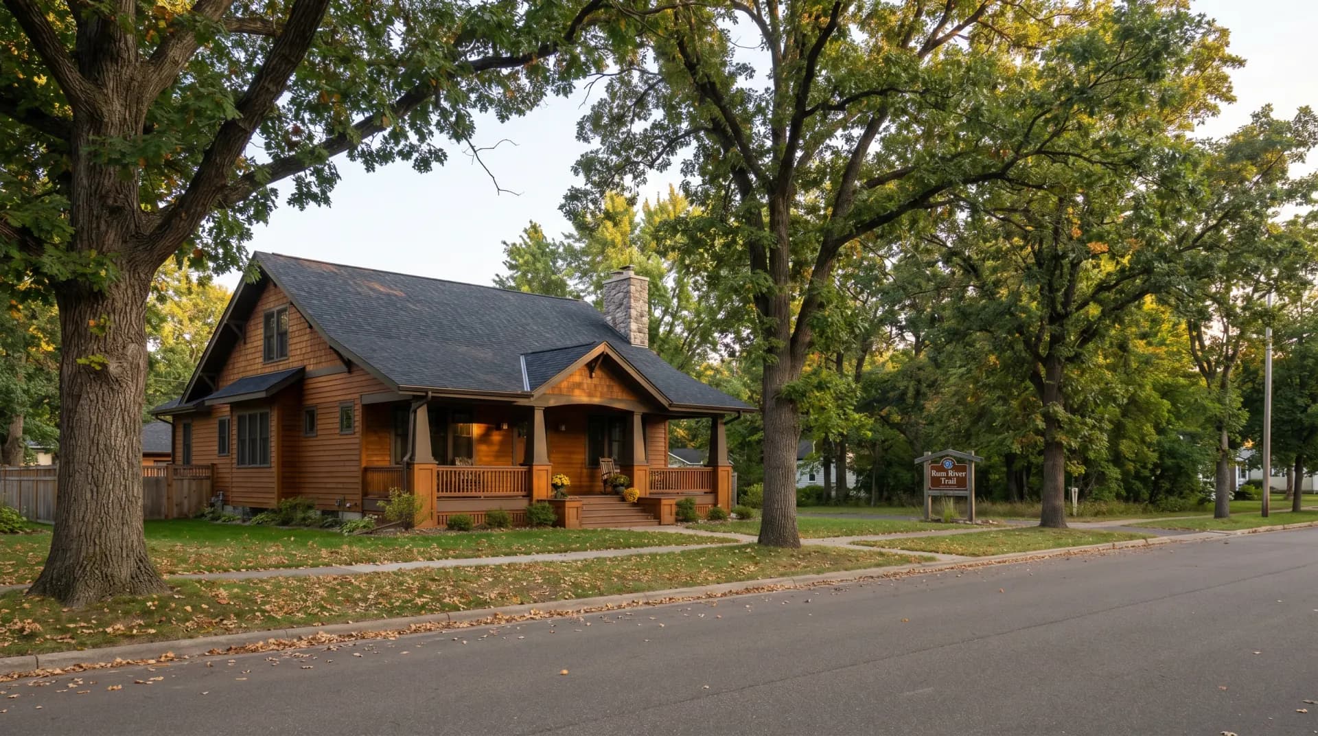Completed roofing project on a Minnesota home — aerial view showing new shingles and clean ridge line
